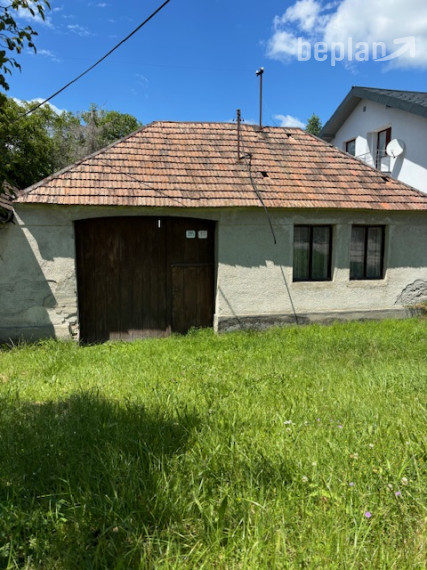 Rodinný dom s veľkorysým pozemkom.